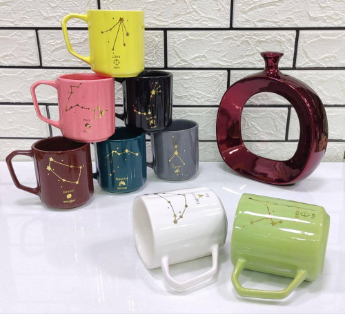 Ceramic mug with gold leaf design in various colors