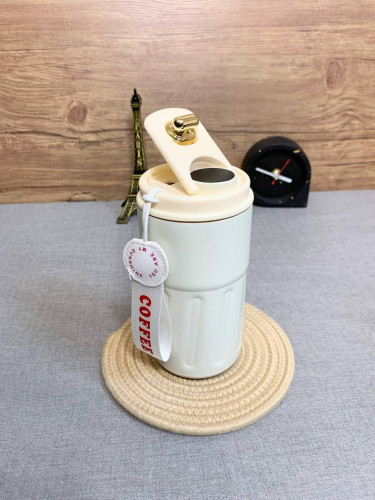 Travel flask with thermometer