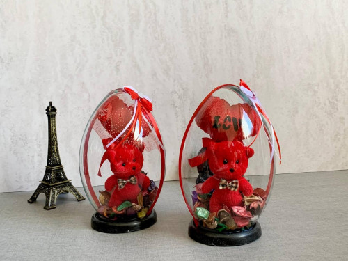 Valentine's Day gift: teddy bear with heart and flower in a glass box