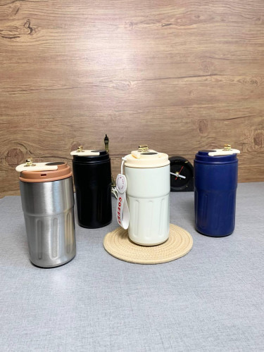 Travel flask with thermometer