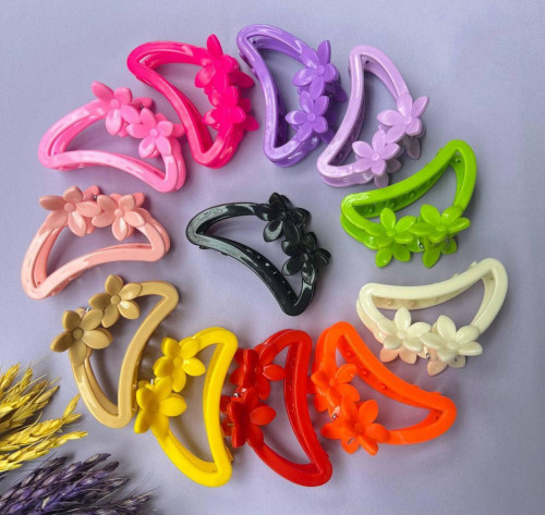 Fancy hair clips with knot design in various colors