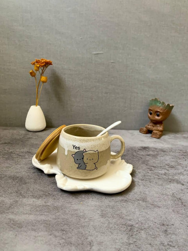 Fancy ceramic mug with wooden lid and spoon - an attractive gift