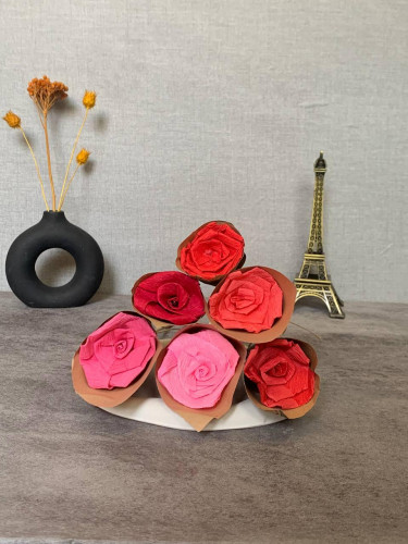 Handmade paper flowers in various colors