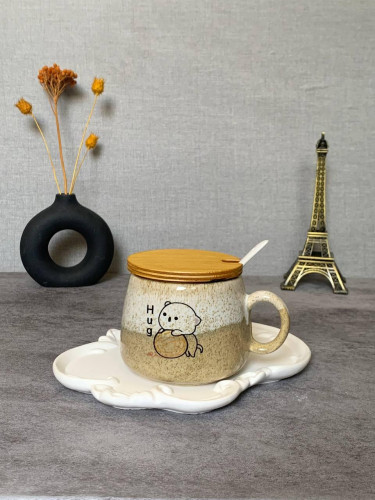 Fancy ceramic mug with wooden lid and spoon - an attractive gift