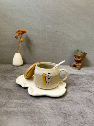 Fancy ceramic mug with wooden lid and spoon - an attractive gift