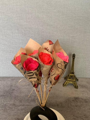 Handmade paper flowers in various colors